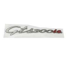 LABEL- ON RIGHT REAR SHIELD "GTS 300 IE" "PIAGGIO GENUINE PART" 300 VESPA GTS  -656238-