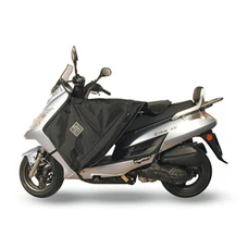TABLIER COUVRE JAMBE TUCANO POUR KYMCO 50-125-200 DINK 2006> (R065-X) (TERMOSCUD) (SYSTEME ANTI-FLOTTEMENT SGAS)